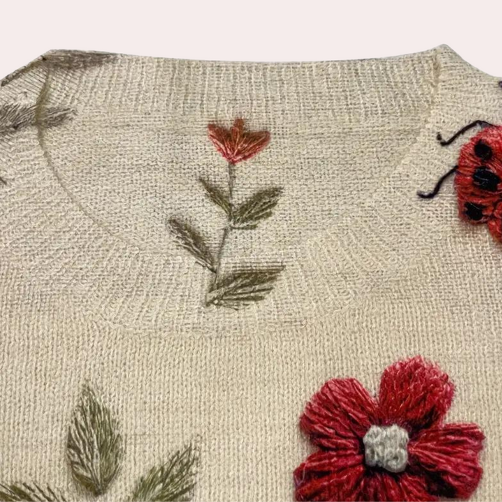 Amira – Elegant damesweater med blomsterdesign