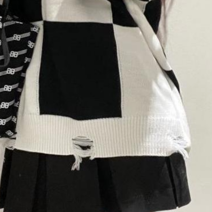 Hulde - Lang, stilfuld ternet sweater til kvinder