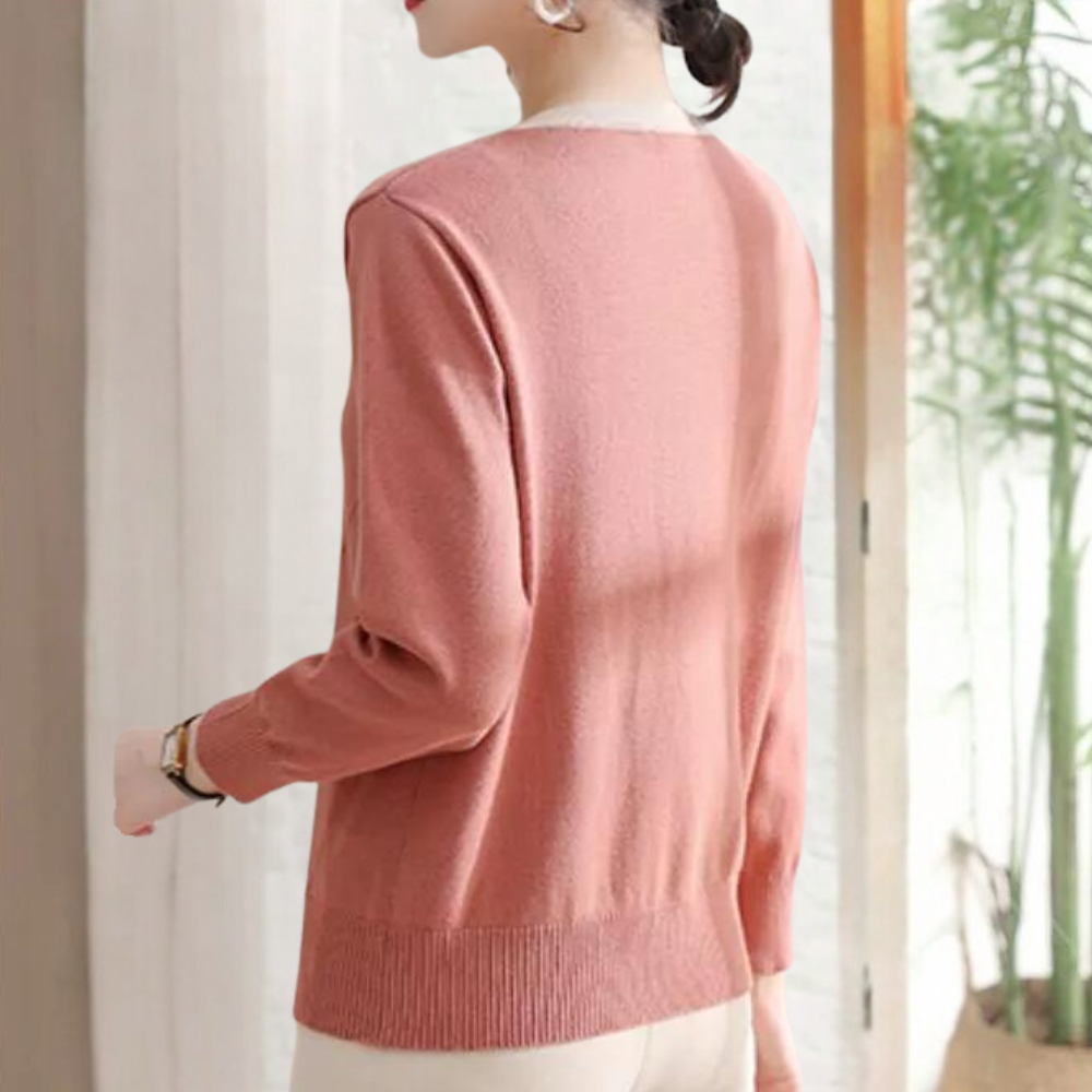 Malina - Elegante sweater med blomsterknap til kvinder