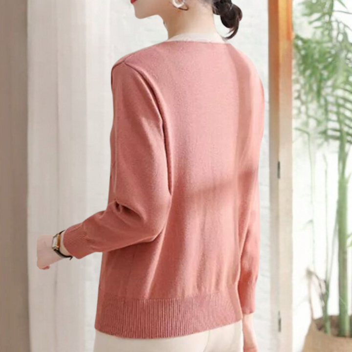 Malina - Elegante sweater med blomsterknap til kvinder