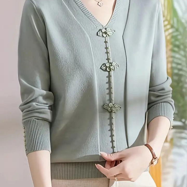 Katiya - Perlebesat sweater med V-hals til kvinder