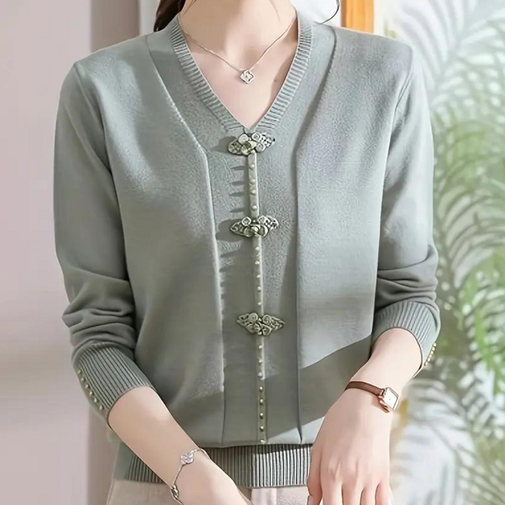 Katiya - Perlebesat sweater med V-hals til kvinder