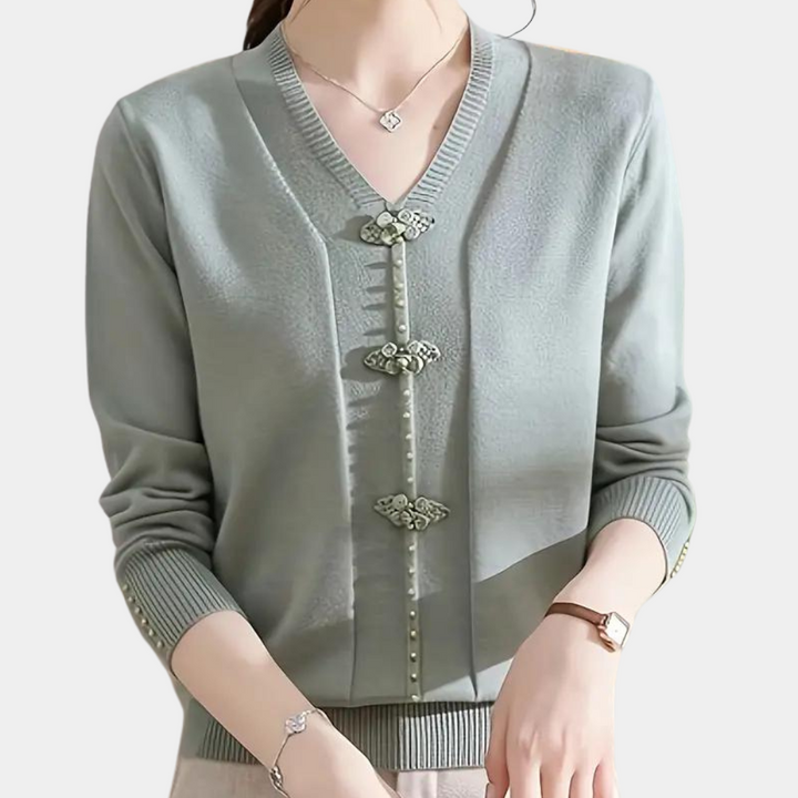 Katiya - Perlebesat sweater med V-hals til kvinder